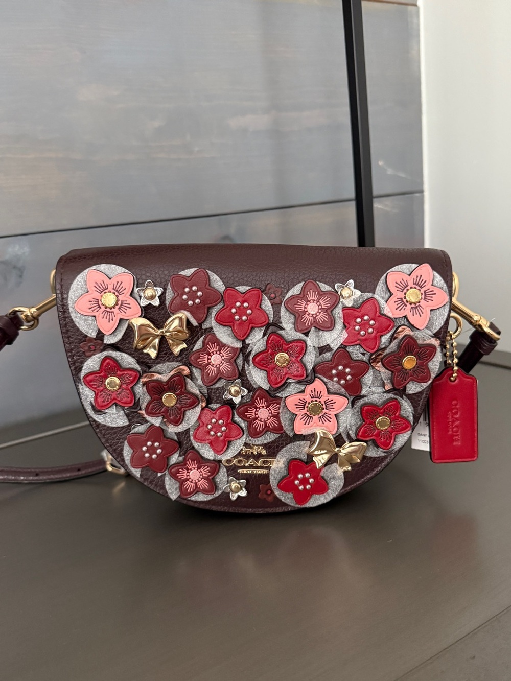 Coach Floral Appliqué Saddle Crossbody Bag in Burgundy with Pink and Red Accents - Picture 3 of 8